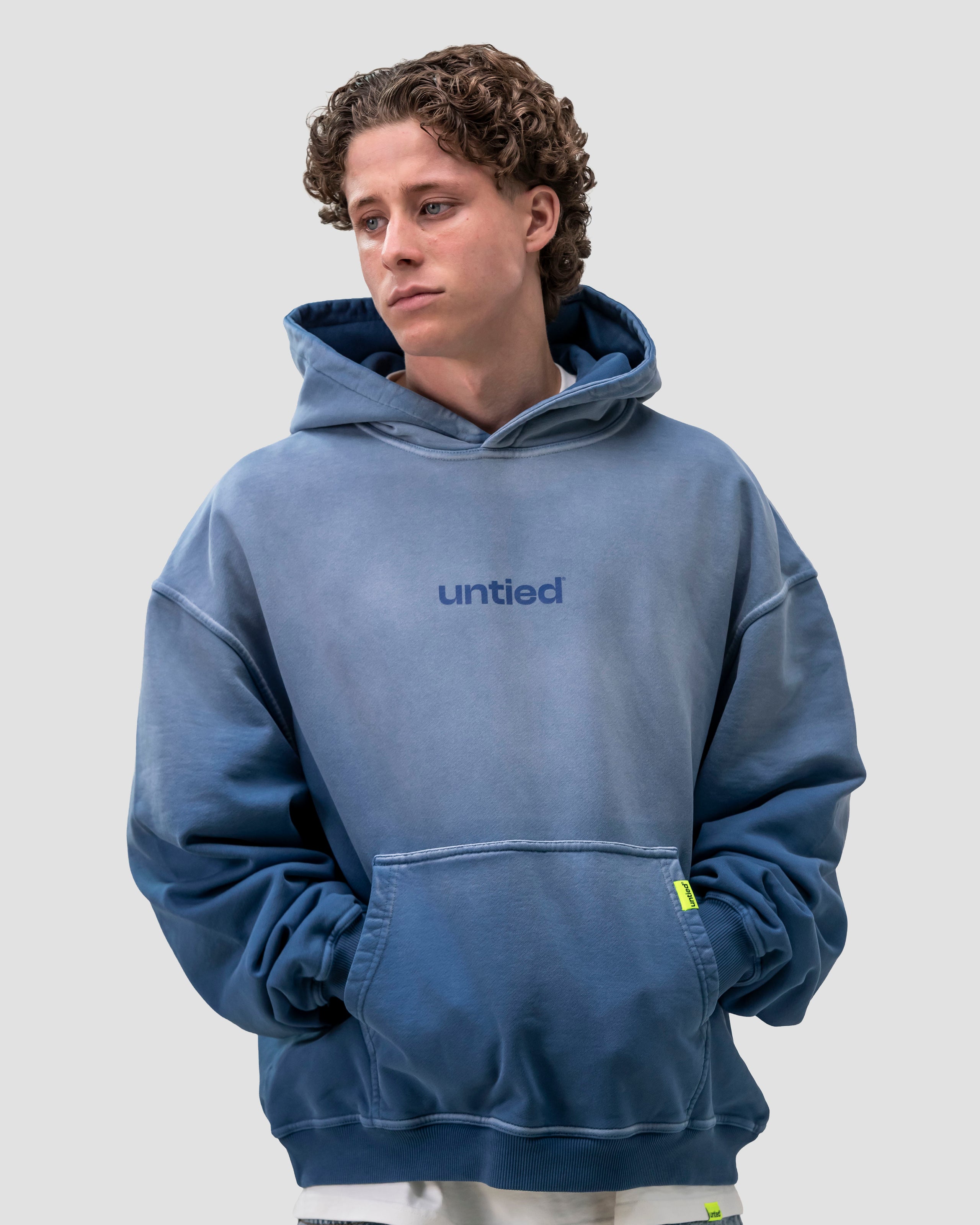 UNTIED® HOODIE — Ensign Blue Sun Faded
