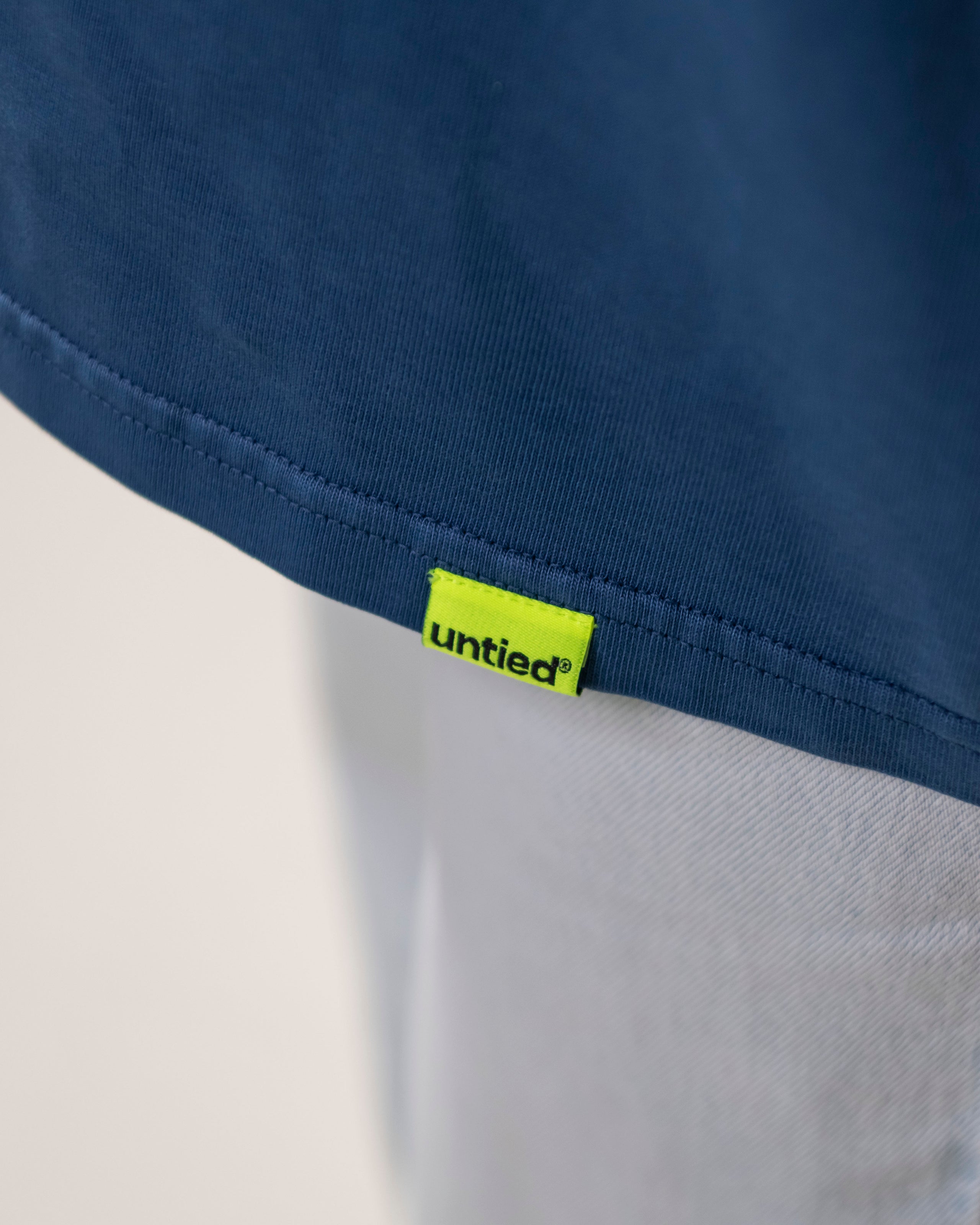 UNTIED® T-SHIRT — Ensign Blue Sun Faded