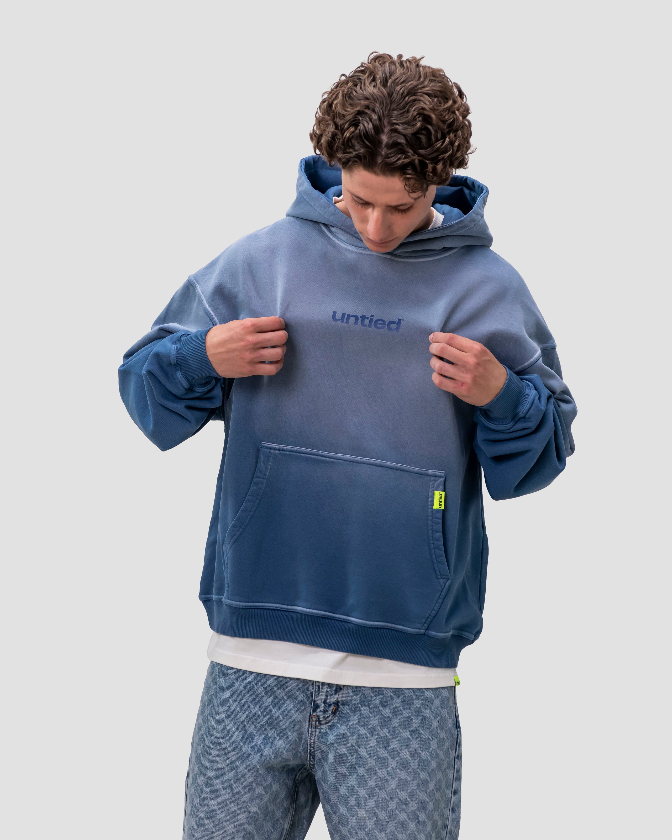 UNTIED® HOODIE — Ensign Blue Sun Faded