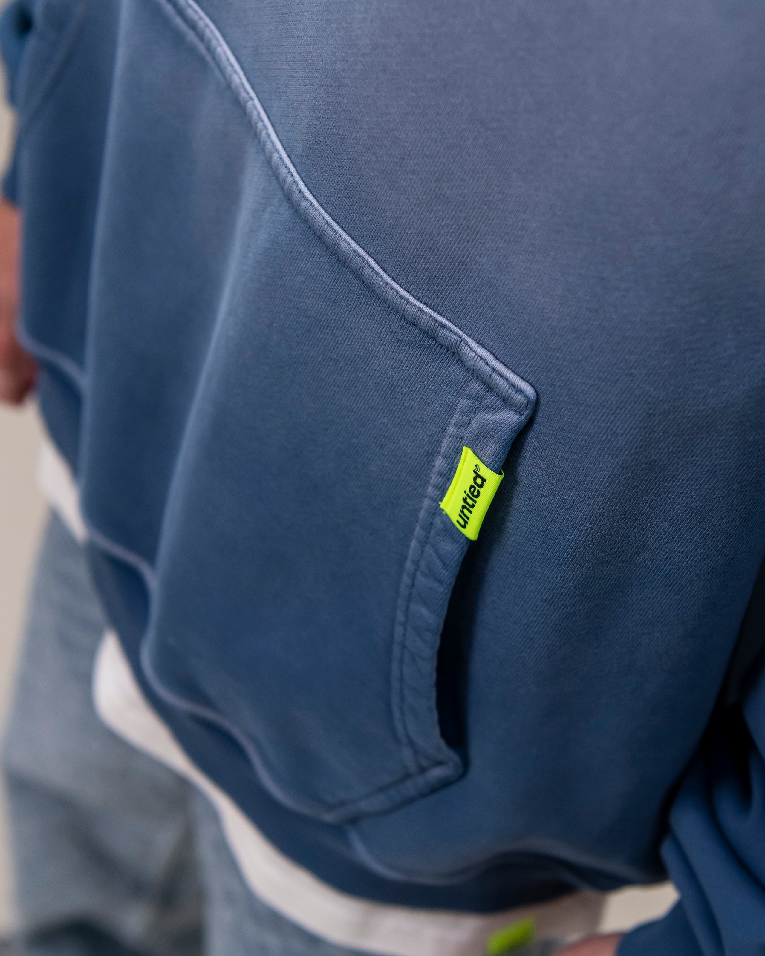 UNTIED® HOODIE — Ensign Blue Sun Faded